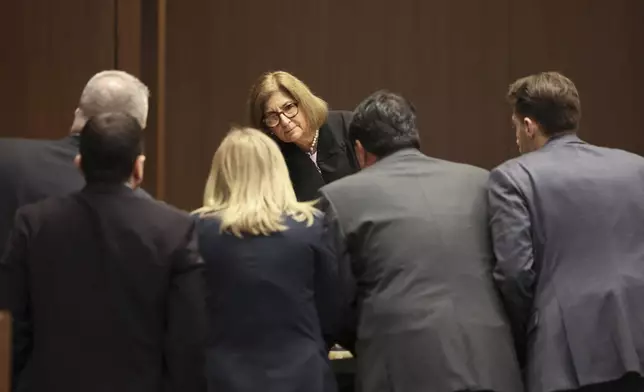 Judge Victoria Rossetti speaks with attorneys during the sentencing hearing of Robert Crimo III at the Lake County Courthouse, in Waukegan, Ill., on Thursday, April 24, 2025. (Stacey Wescott/Chicago Tribune via AP, Pool)