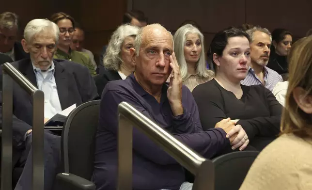 Families react as Judge Victoria Rossetti sentences Robert Crimo III at the Lake County Courthouse, in Waukegan, Ill., on Thursday, April 24, 2025. (Stacey Wescott/Chicago Tribune via AP, Pool)