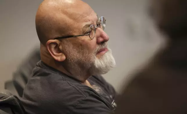 Craig Glodstein, the husband of Katie Goldstein, listens as his wife's killer, Robert E. Crimo III, is sentenced to hundreds of years in prison for the mass shooting that left seven dead and dozens injured, at the Lake County Courthouse, in Waukegan, Ill., Thursday, April 24, 2025. (Stacey Wescott/Chicago Tribune via AP, Pool)