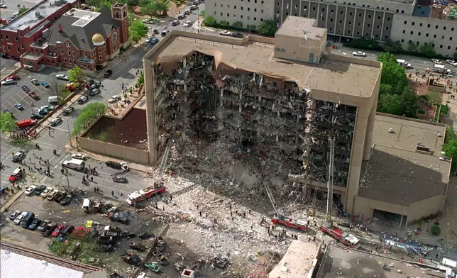 FILE - This aerial view shows the destroyed north side of the Alfred P. Murrah Federal Building in Oklahoma City after a massive bomb blast, April 19, 1995. (AP Photo, File)