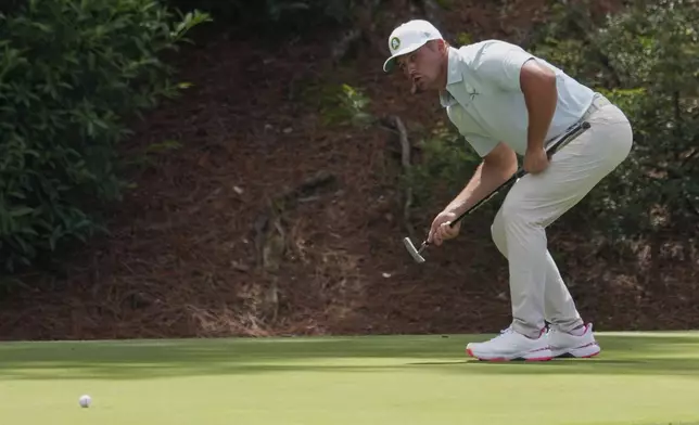 Bryson DeChambeau reacts after missing a putt on the 12th hole during the second round at the Masters golf tournament, Friday, April 11, 2025, in Augusta, Ga. (AP Photo/Matt Slocum)