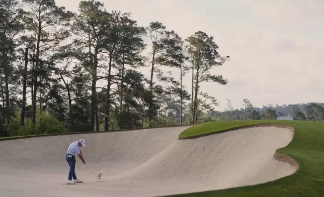 Denny McCarthy hits from the bunker on the second hole during the second round at the Masters golf tournament, Friday, April 11, 2025, in Augusta, Ga. (AP Photo/George Walker IV)