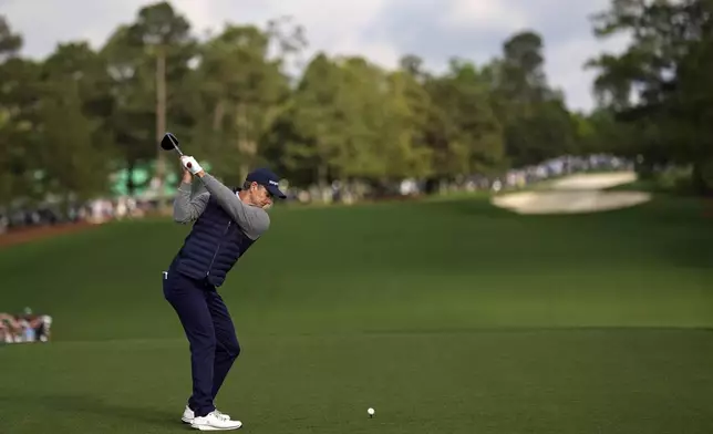Justin Rose hits his tee shot on the first hole during the second round at the Masters golf tournament, Friday, April 11, 2025, in Augusta, Ga. (AP Photo/David J. Phillip)