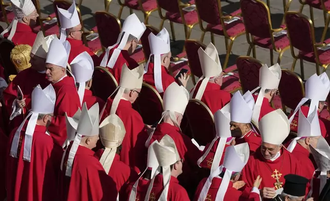 Cardinals take their seats for the funeral of Pope Francis in St. Peter's Square at the Vatican, Saturday, April 26, 2025. (AP Photo/Gregorio Borgia)
