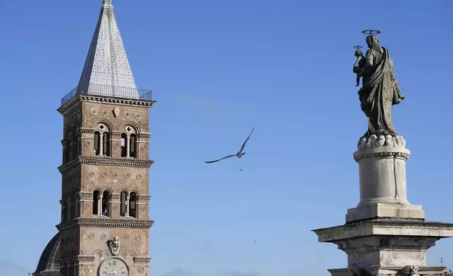 The bell tower of St. Mary Major Basilica, where the burial ceremony of Pope Francis will take place, in Rome, Saturday, April 26, 2025. (AP Photo/Luca Bruno)