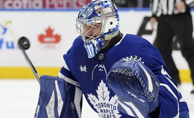 Toronto Maple Leafs' goaltender Anthony Stolarz (41) makes a save against the Ottawa Senators during third period NHL playoff action in Toronto, on Sunday, April 20, 2025. (Frank Gunn/The Canadian Press via AP)
