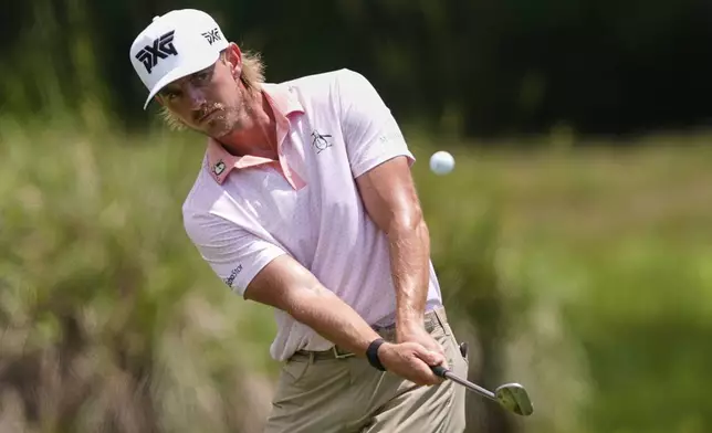 Jake Knapp hits onto the 2nd green during the final round of the PGA Zurich Classic golf tournament at TPC Louisiana in Avondale, La., Sunday, April 27, 2025. (AP Photo/Gerald Herbert)