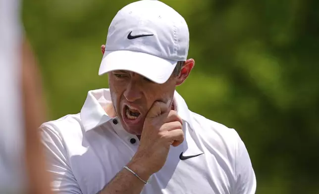 Rory McIlroy, of North Ireland, reacts after hitting off the 2nd tee during the final round of the PGA Zurich Classic golf tournament at TPC Louisiana in Avondale, La., Sunday, April 27, 2025. (AP Photo/Gerald Herbert)