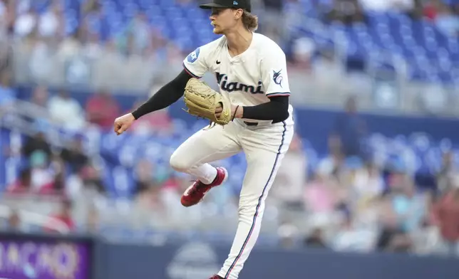 Miami Marlins starting pitcher Max Meyer follows through on a delivery during the first inning of a baseball game against the Cincinnati Reds, Monday, April 21, 2025, in Miami. (AP Photo/Lynne Sladky)