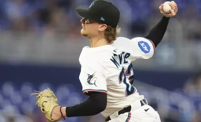 Miami Marlins starting pitcher Max Meyer (23) throws during the fourth inning of a baseball game against the Cincinnati Reds, Monday, April 21, 2025, in Miami. (AP Photo/Lynne Sladky)