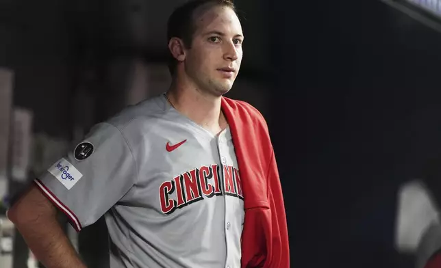 Cincinnati Reds starting pitcher Nick Lodolo looks from the dugout during the sixth inning of a baseball game against the Miami Marlins, Monday, April 21, 2025, in Miami. (AP Photo/Lynne Sladky)