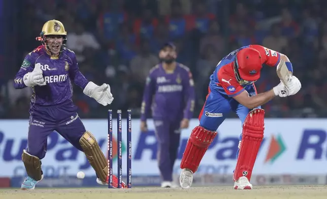 Delhi Capitals' Tristan Stubbs, right, is bowled out by Kolkata Knight Riders' Sunil Narine during the Indian Premier League cricket match between Delhi Capitals and Kolkata Knight Riders at Arun Jaitley Stadium in New Delhi, India, Tuesday, April 29, 2025. (AP Photo)