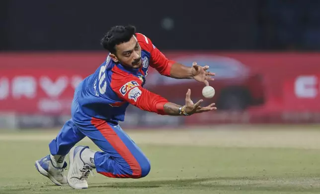 Delhi Capitals' captain Axar Patel drops the catch of Kolkata Knight Riders' Angkrish Raghuvanshi during the Indian Premier League cricket match between Delhi Capitals and Kolkata Knight Riders at Arun Jaitley Stadium in New Delhi, India, Tuesday, April 29, 2025. (AP Photo)