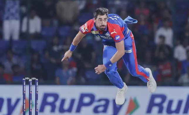 Delhi Capitals' Mitchell Starc bowls a delivery during the Indian Premier League cricket match between Delhi Capitals and Kolkata Knight Riders at Arun Jaitley Stadium in New Delhi, India, Tuesday, April 29, 2025. (AP Photo)