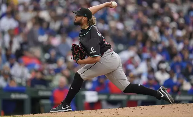 Arizona Diamondbacks pitcher Juan Morillo throws against the Chicago Cubs during the seventh inning of a baseball game Saturday, April 19, 2025, in Chicago. (AP Photo/Erin Hooley)