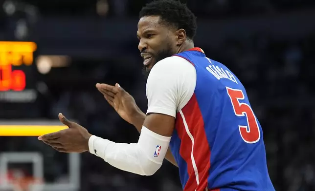Detroit Pistons guard Malik Beasley claps after a shot clock violation against the Minnesota Timberwolves during the first half of an NBA basketball game, Sunday, March 30, 2025, in Minneapolis. (AP Photo/Abbie Parr)