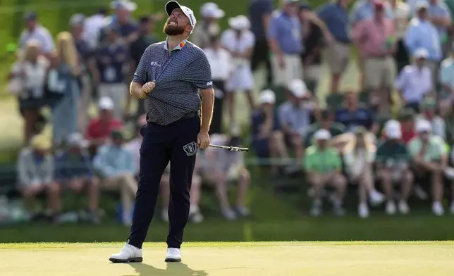 Shane Lowry, of Ireland, reacts after missing a putt on the 15th hole during the first round at the Masters golf tournament, Thursday, April 10, 2025, in Augusta, Ga. (AP Photo/David J. Phillip)