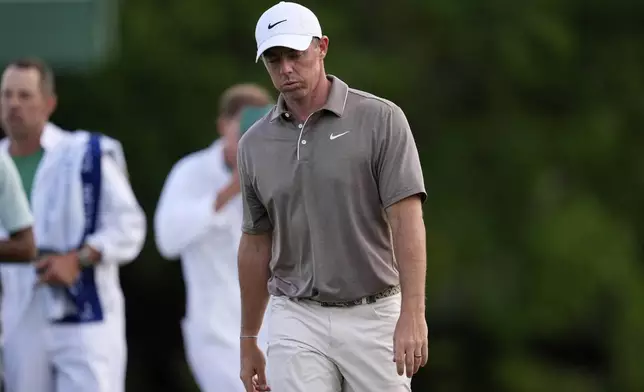 Rory McIlroy, of Northern Ireland, walks off the 18th green after the first round at the Masters golf tournament, Thursday, April 10, 2025, in Augusta, Ga. (AP Photo/George Walker IV)