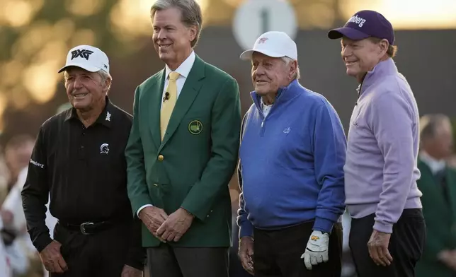 From left: Honorary Starter Gary Player, Augusta National Chairman Fred Ridley, Honorary Starter Jack Nicklaus, and Honorary Starter Tom Watson pose on the first hole during the first round at the Masters golf tournament, Thursday, April 10, 2025, in Augusta, Ga. (AP Photo/David J. Phillip)