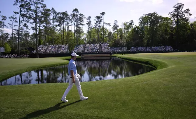 Justin Rose walks to the green on the 15th hole during the first round at the Masters golf tournament, Thursday, April 10, 2025, in Augusta, Ga. (AP Photo/David J. Phillip)
