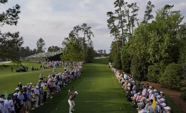 Rory McIlroy, of Northern Ireland, hits his tee shot on the 18th hole during the first round at the Masters golf tournament, Thursday, April 10, 2025, in Augusta, Ga. (AP Photo/Julia Demaree Nikhinson)
