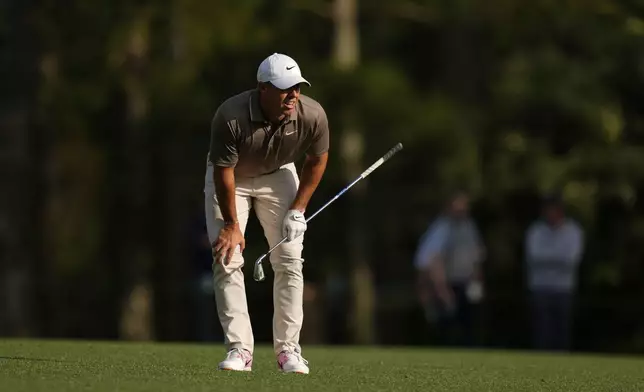 Rory McIlroy, of Northern Ireland, hits from the fairway on the 15th hole during the first round at the Masters golf tournament, Thursday, April 10, 2025, in Augusta, Ga. (AP Photo/Julia Demaree Nikhinson)