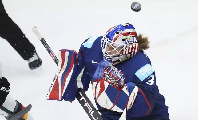 United States' Aerin Frankel makes a save during the quarterfinal match between United States and Germany at the Women's Ice Hockey Championships in Ceske Budejovice, Czech Republic, Thursday, April 17, 2025. (AP Photo/Petr David Josek)