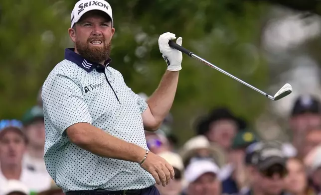 Shane Lowry, of Ireland, watches his tee shot on the fourth hole during the third round at the Masters golf tournament, Saturday, April 12, 2025, in Augusta, Ga. (AP Photo/George Walker IV)