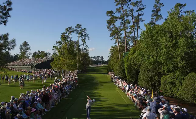 Rory McIlroy, of Northern Ireland, hits his tee shot on the 18th hole during the third round at the Masters golf tournament, Saturday, April 12, 2025, in Augusta, Ga. (AP Photo/Julia Demaree Nikhinson)