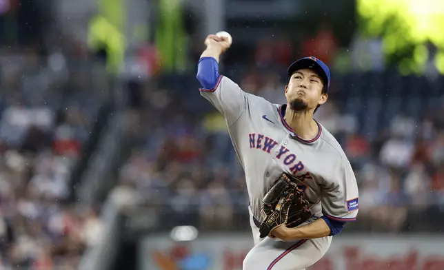 New York Mets pitcher Kodai Senga throws during the third inning of a baseball game against the Washington Nationals in Washington, Friday, April 25, 2025. (AP Photo/Terrance Williams)
