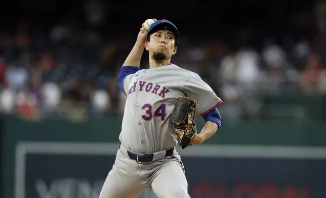 New York Mets pitcher Kodai Senga throws during the first inning of a baseball game against the Washington Nationals in Washington, Friday, April 25, 2025. (AP Photo/Terrance Williams)