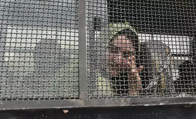 A Pakistan national bids goodbye to her Indian relatives as she leaves in a bus at the Attari-Wagah border between India and Pakistan, following New Delhi’s decision to order almost all Pakistani citizens to leave the country after last week’s deadly attack in Indian-controlled Kashmir, Wednesday, April 30, 2025. (AP Photo/Prabhjot Gill)