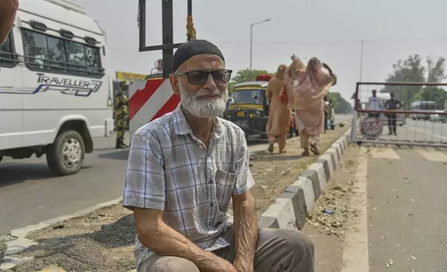 Ahmed Sheikh, an Indian citizen breaks down at the Attari-Wagah border between India and Pakistan, near Amritsar, India, after his Pakistani wife leaves, following New Delhi’s decision to order almost all Pakistani citizens to leave the country after last week’s deadly attack in Indian-controlled Kashmir, Wednesday, April 30, 2025. (AP Photo/Prabhjot Gill)