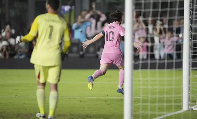 Inter Miami forward Lionel Messi (10) celebrates scoring on a penalty kick against the Los Angeles FC during the second half of a CONCACAF Nations League Quarterfinal Match at Chase Stadium, Wednesday, April 9, 2025 in Fort Lauderdale, Fla. (AP Photo/Jim Rassol)