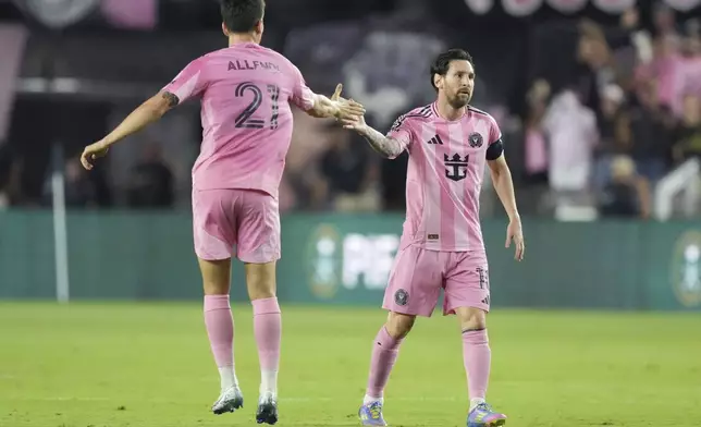 Inter Miami forward Lionel Messi (10) celebrates a goal with forward Tadeo Allende (21) against the Los Angeles FCduring the first half of a CONCACAF Nations League Quarterfinal Match at Chase Stadium, Wednesday, April 9, 2025 in Fort Lauderdale, Fla. (AP Photo/Jim Rassol)