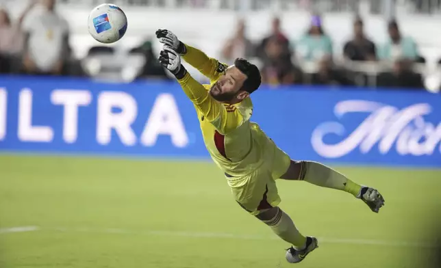 Los Angeles FC goalkeeper Hugo Lloris (1) makes a save against the Inter Miami during the first half of a CONCACAF Nations League Quarterfinal Match at Chase Stadium, Wednesday, April 9, 2025 in Fort Lauderdale, Fla. (AP Photo/Jim Rassol)