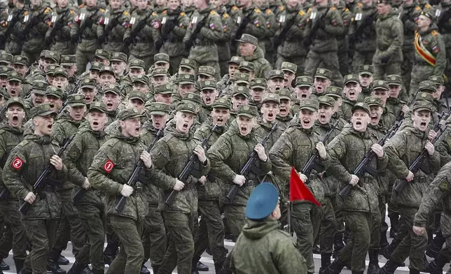 Troops march during a rehearsal for the Victory Day military parade, which will take place at Dvortsovaya (Palace) Square on May 9 to celebrate 80 years after the victory in World War II, in St. Petersburg, Russia, Tuesday, April 22, 2025. (AP Photo/Dmitri Lovetsky)