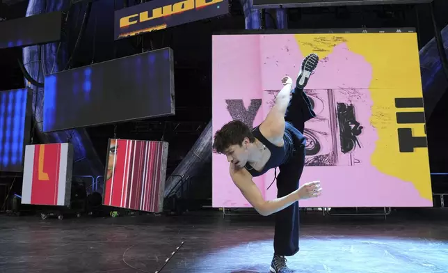 Dancer Diego Pasillas rehearses a move during preparations for Katy Perry's "The Lifetimes Tour" at the Toyota Arena on Wednesday, April 9, 2025, in Ontario, Calif. (AP Photo/Chris Pizzello)