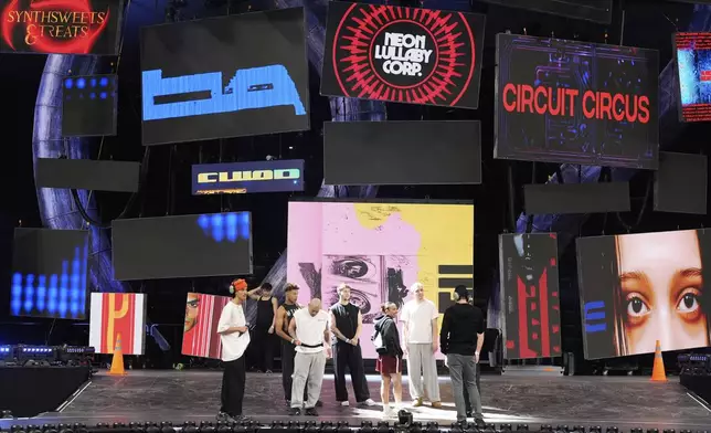 Dancers and choreographers talk onstage during rehearsals for Katy Perry's "The Lifetimes Tour" at the Toyota Arena on Wednesday, April 9, 2025, in Ontario, Calif. (AP Photo/Chris Pizzello)