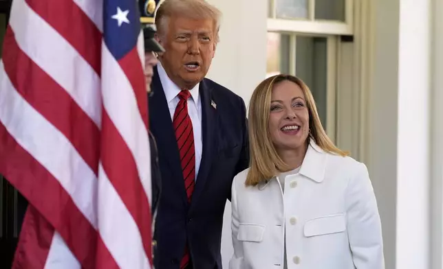 President Donald Trump greets Italy's Prime Minister Giorgia Meloni at the White House, Thursday, April 17, 2025, in Washington. (AP Photo/Alex Brandon)