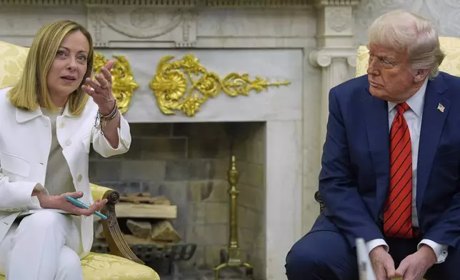 President Donald Trump meets with Italy's Prime Minister Giorgia Meloni in the Oval Office of the White House, Thursday, April 17, 2025, in Washington. (AP Photo/Alex Brandon)