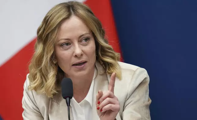 FILE - Italian Premier Giorgia Meloni holds a year-end press conference in Rome, Jan. 9, 2025. (AP Photo/Alessandra Tarantino, File)