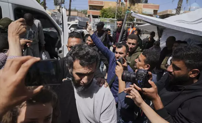 Freed Palestinian prisoner Raheem Salah, who was detain by the Israeli army during its ground operation in the Gaza Strip, arrives at al-Aqsa Hospital in Deir al-Balah, central Gaza, after his release from an Israeli prison, Tuesday, April 29, 2025. (AP Photo/Abdel Kareem Hana)