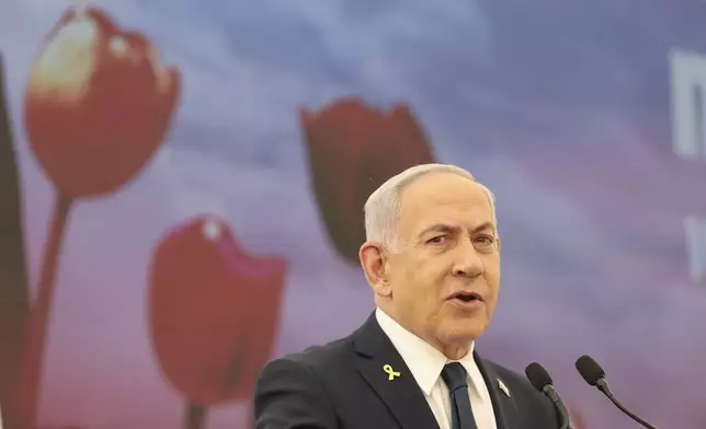 Israeli Prime Minister Benjamin Netanyahu speaks during the annual ceremony at the eve of Israel's Remembrance Day for fallen soldiers (Yom HaZikaron) at the Yad LaBanim Memorial in Jerusalem on Tuesday, April 29, 2025. (Abir Sultan/Pool Photo via AP)