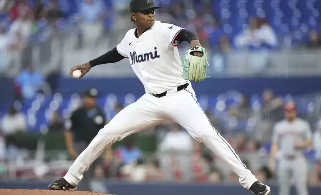Miami Marlins starting pitcher Edward Cabrera throws during the third inning of a baseball game against the Cincinnati Reds, Tuesday, April 22, 2025, in Miami. (AP Photo/Lynne Sladky)