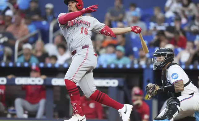 Cincinnati Reds' Noelvi Marte (16) watches after hitting a solo home run during the third inning of a baseball game against the Miami Marlins, Tuesday, April 22, 2025, in Miami. (AP Photo/Lynne Sladky)