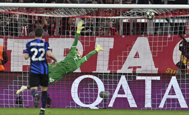 Inter Milan's Lautaro Martinez, not pictured, scores past Bayern's goalkeeper Jonas Urbig during the Champions League quarterfinals first leg soccer match between FC Bayern Munich and Inter Milan, at the Allianz Arena in Munich, Germany, Tuesday, April 8, 2025. (Peter Kneffel/dpa via AP)