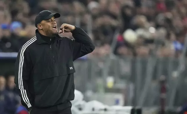 Bayern's head coach Vincent Kompany gives instructions to his players during the Champions League quarterfinals first leg soccer match between FC Bayern Munich and Inter Milan, at the Allianz Arena in Munich, Germany, Tuesday, April 8, 2025. (AP Photo/Matthias Schrader)