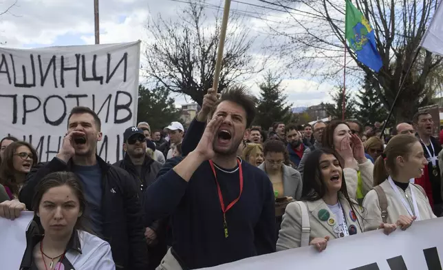 People chant during an anti-corruption protest led by university students in the southwestern town of Novi Pazar, Serbia, Saturday, April 12, 2025. (AP Photo/Marko Drobnjakovic)