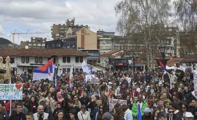 People attend an anti-corruption protest in the southwestern town of Novi Pazar, Serbia, Saturday, April 12, 2025. (AP Photo/Marko Drobnjakovic)